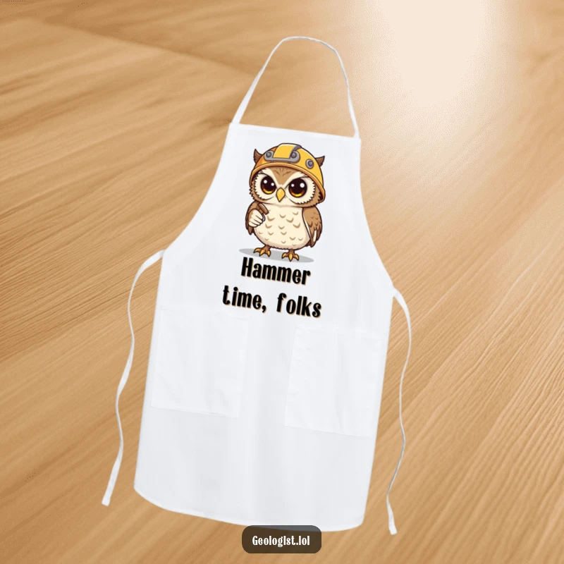 Funny apron depicting a determined snowy owl wearing a helmet and holding mining tools, ideal for cooking.