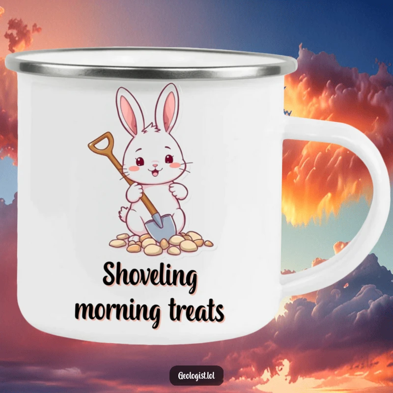 Funny enamel camping mug featuring a cheerful rabbit with a tiny shovel, gathering pebbles, for camping.