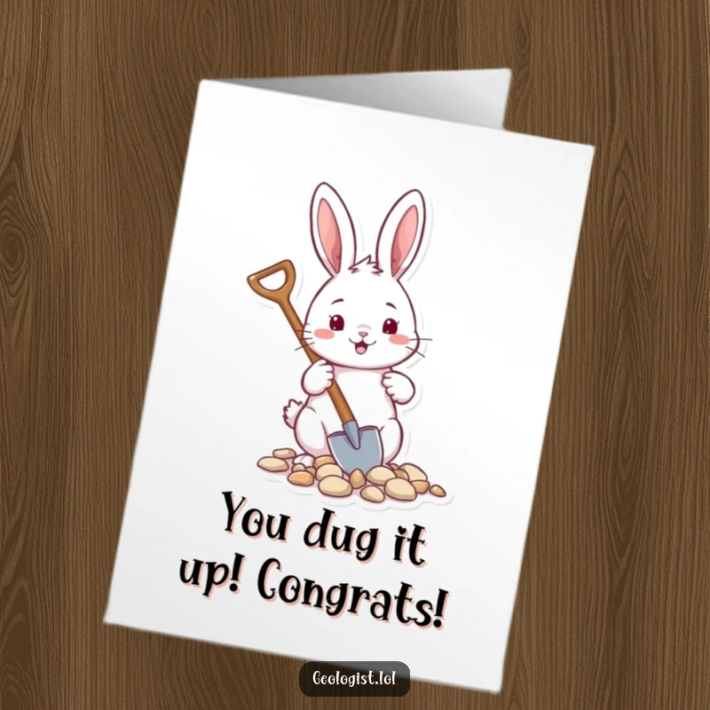 Funny Free Printable Congrats Card: Cheerful rabbit using a tiny shovel to collect small pebbles, symbolizing gathering achievements.