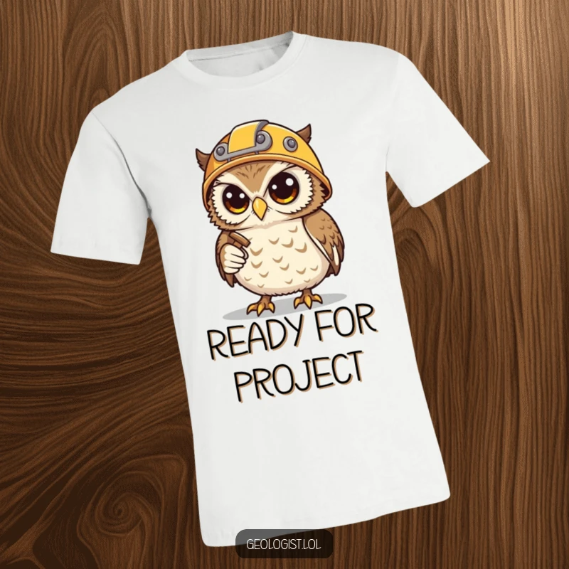 Funny T-shirt with a determined snowy owl wearing a helmet, holding a hammer and pickaxe, ready for mining.