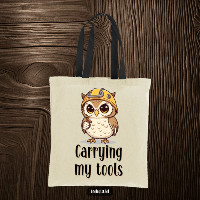 Funny tote bag showcasing a determined snowy owl miner with a helmet, hammer, and pick, ready to haul.